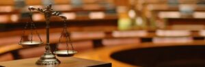 Scales of justice in a courtroom.